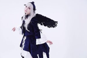 Rating: Safe Score: 0 Tags: 1girl auto_tagged black_ribbon dress gradient gradient_background hairband lips long_hair long_sleeves ribbon solo suigintou wings User: admin