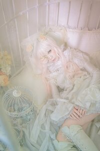 Rating: Safe Score: 0 Tags: 1girl boots doll_joints dress flower frills green_eyes hair_ornament kirakishou lolita_fashion long_hair pink_hair sitting solo white_dress User: admin
