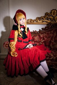 Rating: Safe Score: 0 Tags: 1girl blonde_hair blue_eyes bonnet boots dress flower long_hair looking_at_viewer red_dress shinku sitting solo User: admin