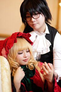 Rating: Safe Score: 0 Tags: 1boy black_hair blonde_hair blurry closed_eyes depth_of_field dress drill_hair glasses lips nose realistic sakurada_jun shinku solo User: admin