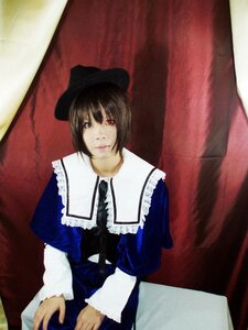 Rating: Safe Score: 0 Tags: 1girl bangs blue_dress brown_hair closed_mouth dress hat heterochromia long_sleeves looking_at_viewer red_eyes short_hair sitting solo souseiseki User: admin