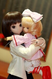 Rating: Safe Score: 0 Tags: 2girls black_hair blonde_hair blurry brown_eyes depth_of_field doll frills hinaichigo hug jewelry kashiwaba_tomoe long_sleeves multiple_girls ring short_hair solo User: admin