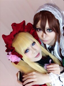 Rating: Safe Score: 0 Tags: 2girls blonde_hair blue_eyes brown_hair cellphone flower hat lips long_hair looking_at_viewer multiple_cosplay multiple_girls phone realistic rose smile tagme User: admin