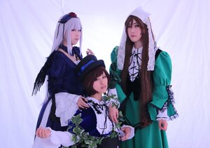 Rating: Safe Score: 0 Tags: 3girls blue_dress blue_eyes brown_hair dress green_dress hat long_hair looking_at_viewer mini_hat multiple_cosplay multiple_girls short_hair souseiseki suigintou suiseiseki tagme top_hat wings User: admin