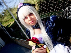 Rating: Safe Score: 0 Tags: 1girl blonde_hair chain-link_fence fence gothic_lolita hairband honeycomb_(pattern) honeycomb_background lolita_fashion long_hair long_sleeves looking_at_viewer pink_eyes smile solo stained_glass suigintou upper_body white_hair User: admin