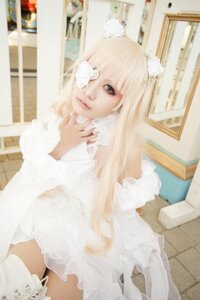 Rating: Safe Score: 0 Tags: 1girl bangs blonde_hair blue_eyes blurry depth_of_field dress kirakishou library lips long_hair photo sitting solo thighhighs white_dress User: admin