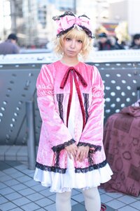 Rating: Safe Score: 0 Tags: 1girl blonde_hair blurry blurry_background building city depth_of_field dress frills hat hinaichigo long_sleeves looking_at_viewer outdoors photo realistic ribbon short_hair smile solo standing wide_sleeves User: admin
