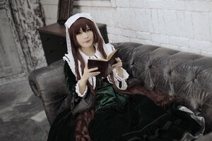 Rating: Safe Score: 0 Tags: 1girl black_dress book brown_hair dress green_dress habit holding long_hair long_sleeves nun sitting solo suiseiseki User: admin