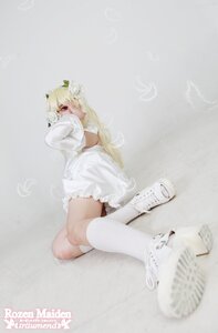 Rating: Safe Score: 0 Tags: 1girl blonde_hair dress feathers flower frills hair_ornament kirakishou kneehighs long_hair long_sleeves lying on_side shoes solo white_dress white_footwear white_legwear User: admin