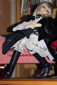 Rating: Safe Score: 0 Tags: 1girl auto_tagged black_legwear blurry boots chair doll dress frilled_dress frills indoors jewelry sitting solo suigintou thighhighs underwear User: admin