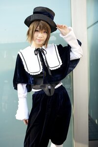 Rating: Safe Score: 0 Tags: 1girl arm_at_side bangs blonde_hair blue_eyes capelet closed_mouth dress hat lips long_sleeves looking_at_viewer realistic ribbon short_hair skirt solo souseiseki standing top_hat User: admin