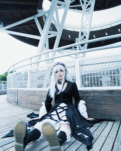 Rating: Safe Score: 0 Tags: 1girl black_legwear dress gothic_lolita lolita_fashion long_hair sitting solo suigintou thighhighs white_hair User: admin