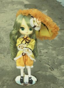Rating: Safe Score: 0 Tags: 1girl doll dress flower frills green_hair hair_ornament holding_umbrella kanaria long_hair long_sleeves parasol rain ribbon solo standing umbrella yellow_dress User: admin