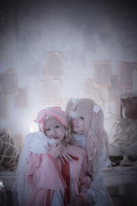 Rating: Safe Score: 0 Tags: blonde_hair blurry building dress flower hair_ornament hat long_hair multiple_cosplay multiple_girls pink_dress remilia_scarlet siblings tagme User: admin