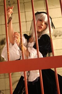 Rating: Safe Score: 0 Tags: 1girl frills long_hair long_sleeves maid photorealistic realistic solo standing suigintou white_hair User: admin