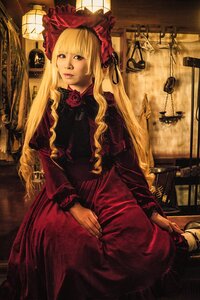 Rating: Safe Score: 0 Tags: 1girl blonde_hair blue_eyes bonnet dress flower indoors lips long_hair red_dress rose shinku sitting solo User: admin