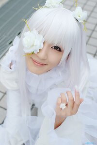 Rating: Safe Score: 0 Tags: 1girl artist_name bangs blurry blurry_background blurry_foreground closed_mouth depth_of_field flower hair_over_one_eye kirakishou lips looking_at_viewer motion_blur photo smile solo sweater white_flower white_hair User: admin