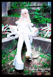 Rating: Safe Score: 0 Tags: 1girl barefoot copyright_name dress flower kirakishou leaf letterboxed long_hair pillarboxed plant sitting solo white_dress white_hair User: admin