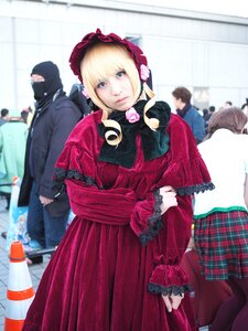 Rating: Safe Score: 0 Tags: 1girl 6+boys blonde_hair blue_eyes blurry blurry_background bonnet depth_of_field dress long_sleeves looking_at_viewer multiple_boys shinku solo solo_focus standing User: admin