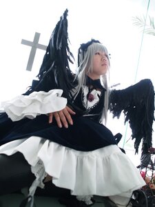 Rating: Safe Score: 0 Tags: 1girl black_wings dress feathered_wings feathers frills hairband long_hair long_sleeves silver_hair solo standing suigintou wide_sleeves wings User: admin