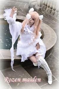 Rating: Safe Score: 0 Tags: 1girl blonde_hair boots cross-laced_footwear dress kirakishou knee_boots lips long_hair pink_hair sitting solo white_dress white_footwear white_theme User: admin