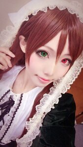 Rating: Safe Score: 0 Tags: 1girl bangs closed_mouth eyelashes frills green_eyes lace lips looking_at_viewer red_eyes simple_background solo suiseiseki upper_body User: admin