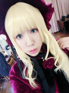 Rating: Safe Score: 0 Tags: 1girl bangs blonde_hair blue_eyes closed_mouth curtains eyelashes flower hat indoors lips long_hair looking_at_viewer pink_rose rose shinku solo upper_body User: admin