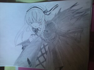 Rating: Safe Score: 0 Tags: 1girl black_wings dress feathered_wings frilled_sleeves frills hairband image long_hair long_sleeves looking_at_viewer monochrome photo ribbon simple_background solo suigintou traditional_media very_long_hair white_background wings User: admin