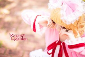 Rating: Safe Score: 0 Tags: 1girl auto_tagged blonde_hair blurry blurry_background blurry_foreground depth_of_field dress english_text hat hinaichigo photo ribbon solo striped User: admin