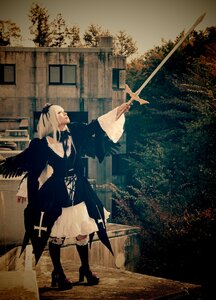 Rating: Safe Score: 0 Tags: 1girl auto_tagged holding long_sleeves profile solo standing suigintou sword weapon User: admin