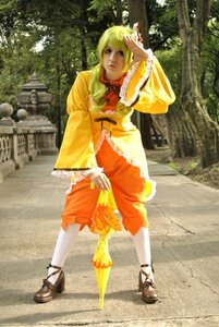 Rating: Safe Score: 0 Tags: 1girl blonde_hair day dress frills kanaria orange_dress outdoors solo standing tree white_legwear yellow_dress User: admin