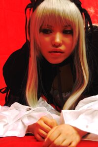 Rating: Safe Score: 0 Tags: 1girl blonde_hair lips long_hair realistic red_background solo suigintou User: admin