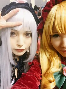 Rating: Safe Score: 0 Tags: alice_margatroid bangs blonde_hair bow doll hair_bow lips looking_at_viewer multiple_cosplay multiple_girls realistic shanghai_doll short_hair smile tagme traditional_media User: admin