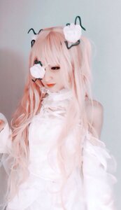 Rating: Safe Score: 0 Tags: 1girl bangs blurry closed_mouth depth_of_field hair_ornament kirakishou long_hair pink_hair solo striped upper_body vertical_stripes white_shirt User: admin