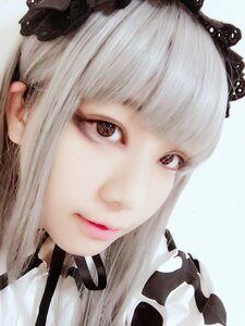 Rating: Safe Score: 0 Tags: 1girl bangs black_flower brown_eyes closed_mouth eyelashes face flower hair_flower hair_ornament lips long_hair looking_at_viewer portrait simple_background solo suigintou User: admin