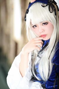 Rating: Safe Score: 0 Tags: 1girl bangs black_ribbon blurry blurry_background closed_mouth depth_of_field hair_ribbon lips long_hair long_sleeves looking_at_viewer nail_polish purple_eyes ribbon solo suigintou upper_body white_hair User: admin