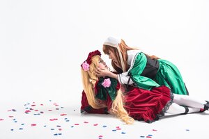 Rating: Safe Score: 0 Tags: 2girls blonde_hair blue_eyes brown_hair dress flower long_hair multiple_cosplay multiple_girls pantyhose petals rose shinku tagme white_legwear yuri User: admin