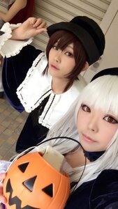 Rating: Safe Score: 0 Tags: 2girls black_headwear brown_eyes brown_hair halloween hat jack-o'-lantern lace lips long_hair long_sleeves looking_at_viewer multiple_cosplay multiple_girls photo realistic smile tagme white_hair User: admin