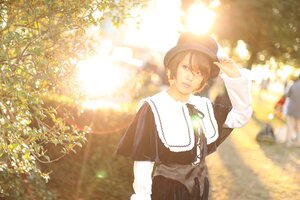 Rating: Safe Score: 0 Tags: 1girl blurry brown_hair capelet earrings hat jewelry looking_at_viewer outdoors solo souseiseki User: admin