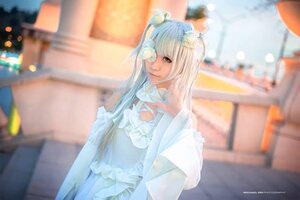 Rating: Safe Score: 0 Tags: 1girl artist_name blurry blurry_background blurry_foreground depth_of_field dress flower frills hair_flower hair_ornament kirakishou long_hair outdoors photo solo watermark web_address User: admin