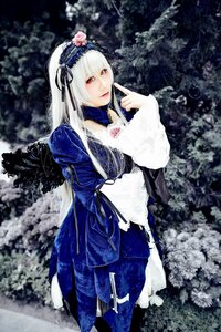 Rating: Safe Score: 0 Tags: 1girl dress flower frills hairband long_hair long_sleeves looking_at_viewer red_eyes silver_hair solo suigintou wings User: admin