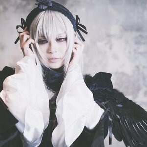 Rating: Safe Score: 0 Tags: 1girl black_ribbon closed_mouth fur_trim hair_ribbon hairband lips long_sleeves looking_at_viewer ribbon solo suigintou upper_body User: admin