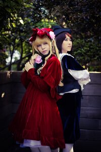 Rating: Safe Score: 0 Tags: 2girls back-to-back blonde_hair blue_eyes blurry coat depth_of_field dress flower hat long_hair long_sleeves looking_at_viewer looking_back multiple_cosplay multiple_girls outdoors red_dress rose standing tagme white_legwear User: admin