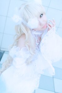Rating: Safe Score: 0 Tags: 1girl blonde_hair blue_eyes blurry blurry_background chain-link_fence depth_of_field dress fence honeycomb_(pattern) kirakishou lips long_hair long_sleeves looking_at_viewer solo tile_floor tile_wall tiles User: admin