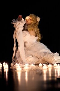 Rating: Safe Score: 0 Tags: 1girl black_background blonde_hair blurry crown dress kirakishou lips long_hair profile sitting solo white_dress User: admin
