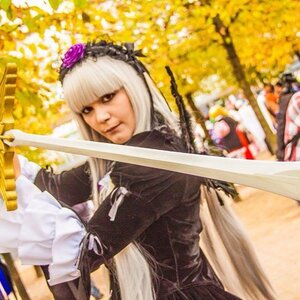 Rating: Safe Score: 0 Tags: 1boy flower hair_ornament holding holding_sword holding_weapon long_hair solo suigintou sword weapon white_hair User: admin