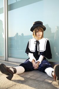 Rating: Safe Score: 0 Tags: 1girl auto_tagged blonde_hair capelet dress hat lips long_sleeves realistic ribbon shoes short_hair sitting sky solo souseiseki User: admin