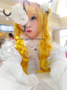 Rating: Safe Score: 0 Tags: 1girl black_eyes blonde_hair flower hair_flower kirakishou library lips long_hair parted_lips photo solo watermark User: admin