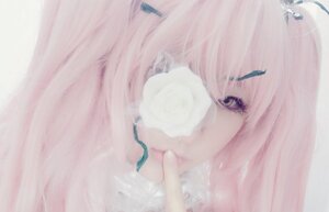Rating: Safe Score: 0 Tags: 1girl bangs close-up face hair_ornament hair_over_one_eye kirakishou lips pink_hair simple_background solo User: admin