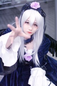 Rating: Safe Score: 0 Tags: 1girl blurry blurry_background blurry_foreground closed_mouth depth_of_field dress flower hair_flower hair_ornament long_hair long_sleeves looking_at_viewer photo pink_rose purple_rose rose solo suigintou white_hair User: admin